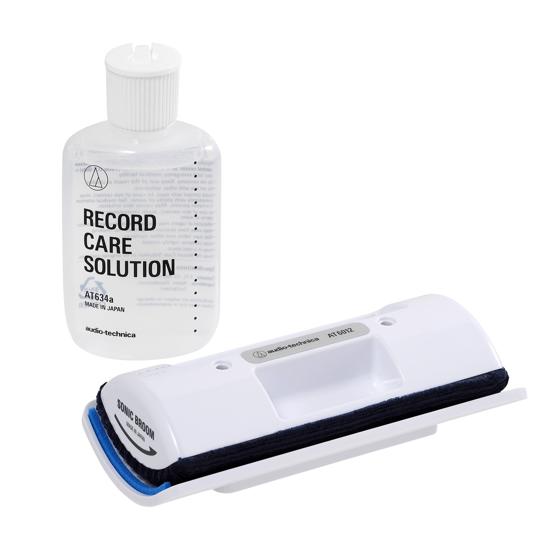 Audio-Technica record cleaning brush and record care solution bottle on a white background