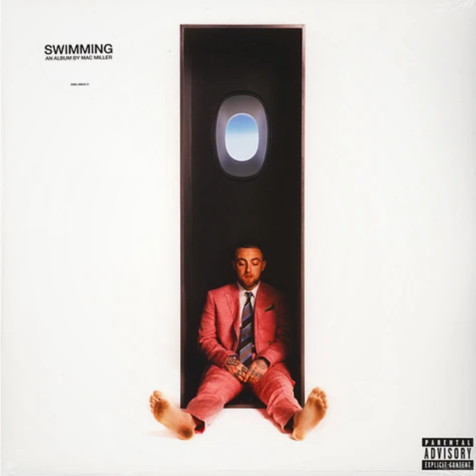 Mac Miller -Swimming vinyl LP album cover featuirng a minimal portrait of Mac Miller seated in a suit.