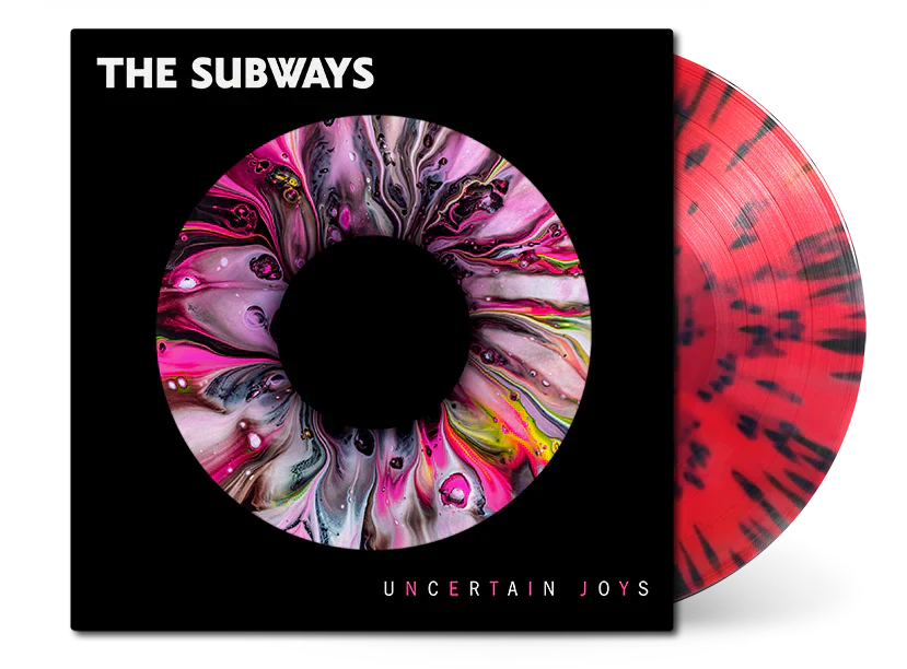 The Subways - Uncertain Joys red and black splatter vinyl LP record partially removed from sleeve